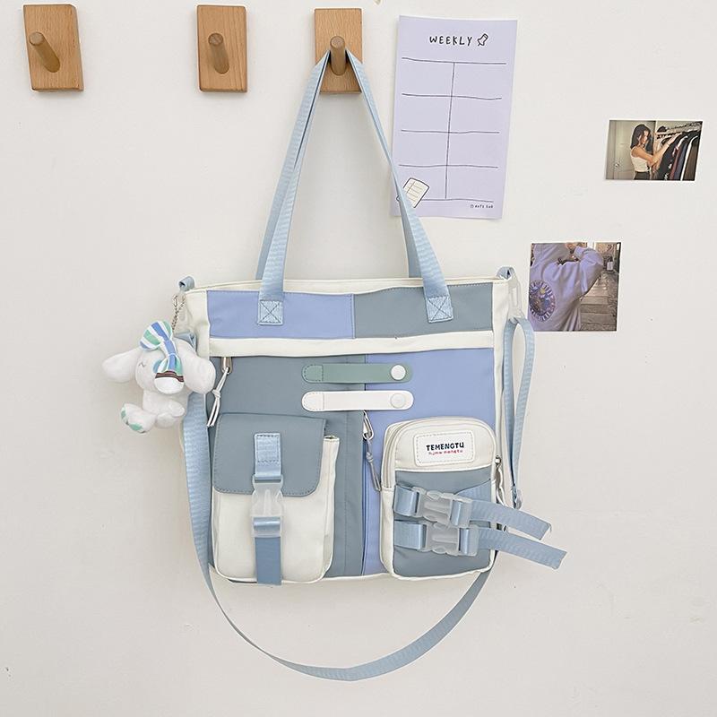 Cute versatile color matching schoolbag backpack new campus contrasting color middle and high school students large-capacity backpack