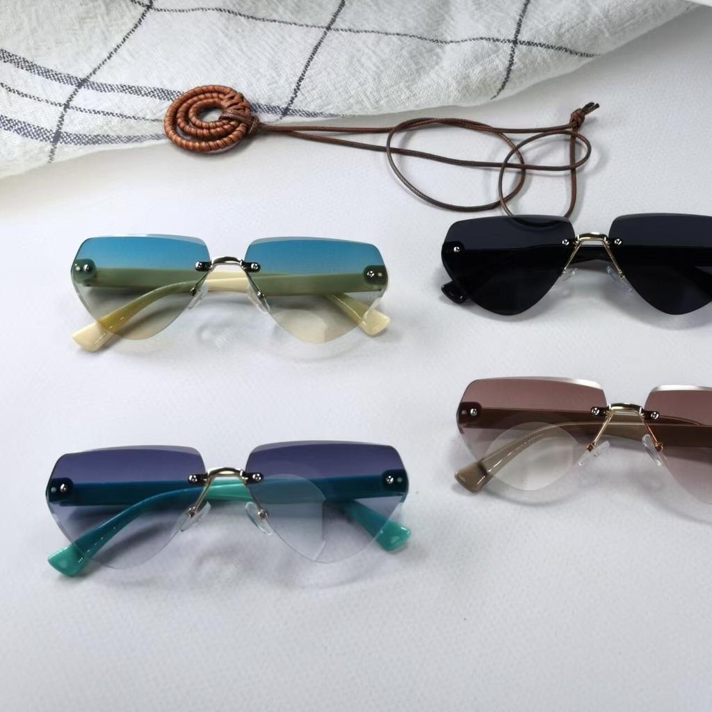 New Children's Sunglasses Fashion Frameless Irregular Personality Trend Dopamine Color Ocean Lens Cross 26016