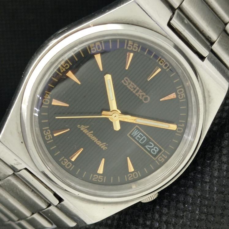 

Б/У винтажные часы SEIKO AUTOMATIC 7009A JAPAN MENS D/D BLACK WATCH 608g-a316402-2 SKU608g-a316402