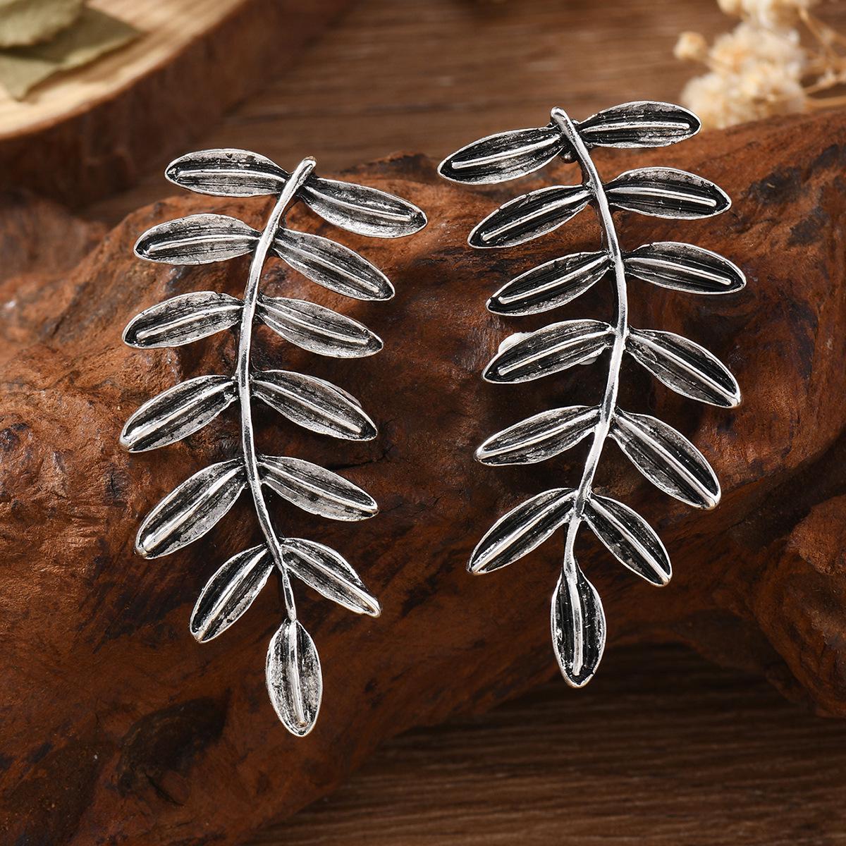Retro Geometric Leaf Earrings: Electroplated Alloy Irregular Ear Ornaments for Women