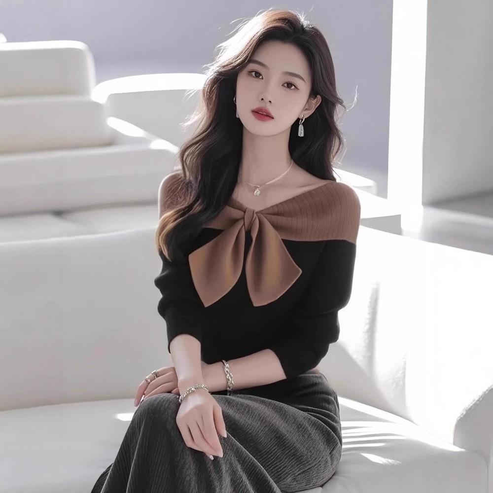 

Korean unique bow gently knitted black contrasting color versatile one-word shoulder long-sleeved sweater one size fits all
