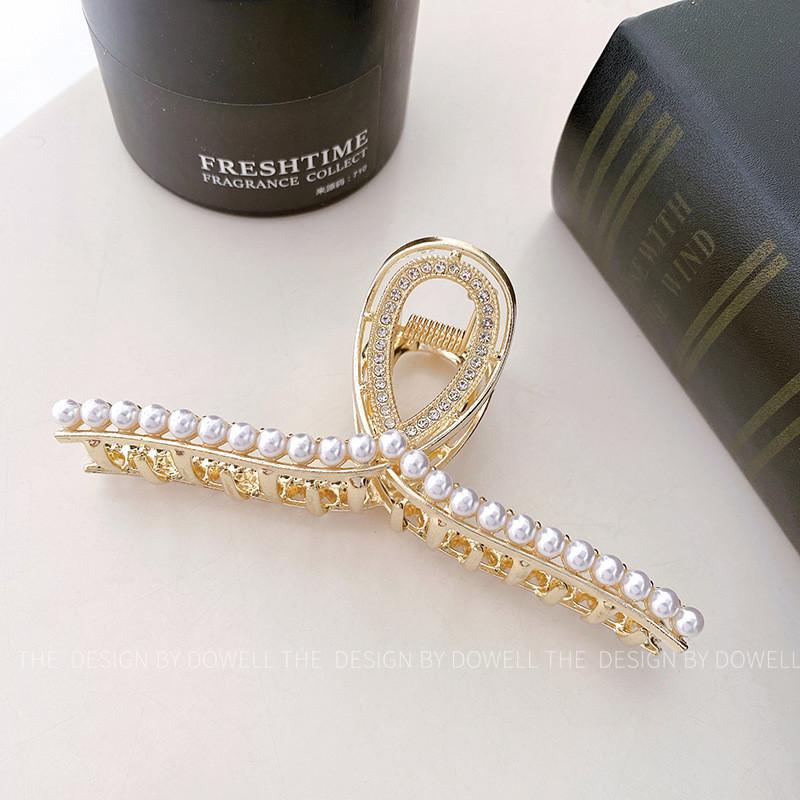 

Элегантная заколка-краб для волос с жемчугом и стразами для женщин. Стильный геометрический дизайн. Идеально подходит для модных причесок. RibbonPearl Clip