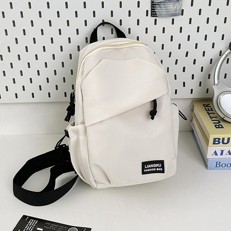 Schoolbag Korean version of simple small backpack versatile messenger bag men's casual men's sports breast bag women's large-capacity student shoulder
