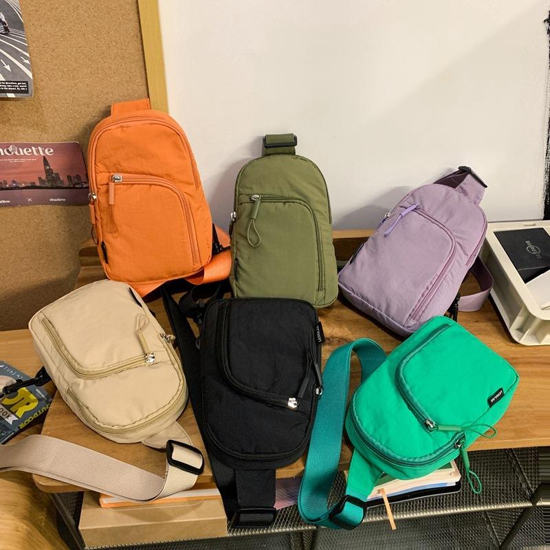 Large capacity messenger bag breast bag men's 2025 new couple casual fashion shoulder bag cycling sports backpack women's tide