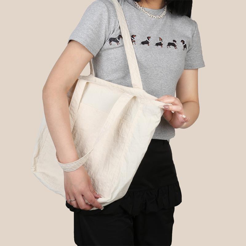 Casual simple large-capacity bag women's new niche versatile shoulder bag class commuter tote bag