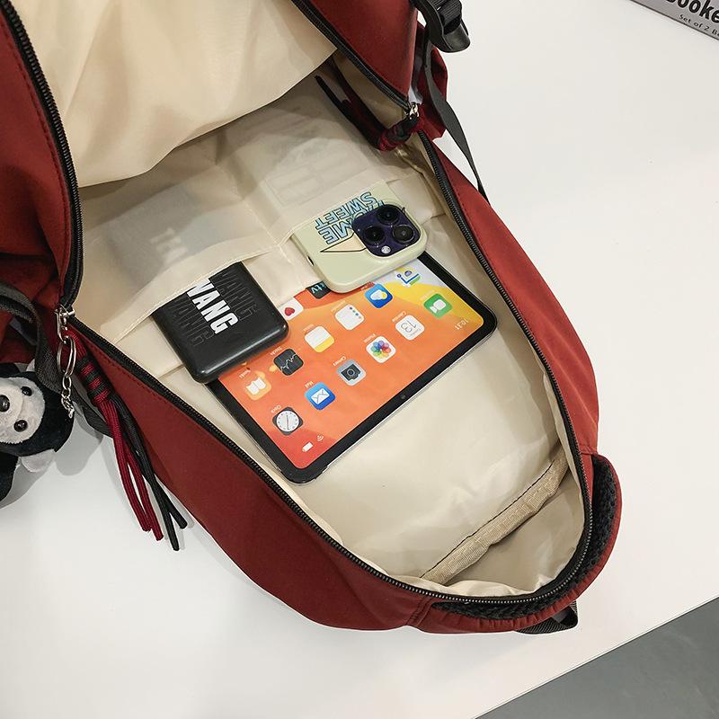 Ryggsäck för män i enfärgat utförande Ryggsäck för kvinnor med flera fickor Stor kapacitet Student Skolväska