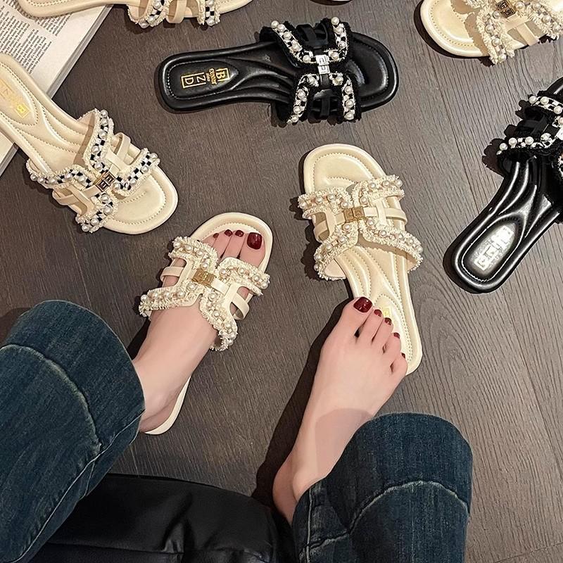 Xiaoxiangfeng plattbottnade coola tofflor dam sommar designkänsla mode bär fe-stil mjuk sula avslappnad pärla enords toffel