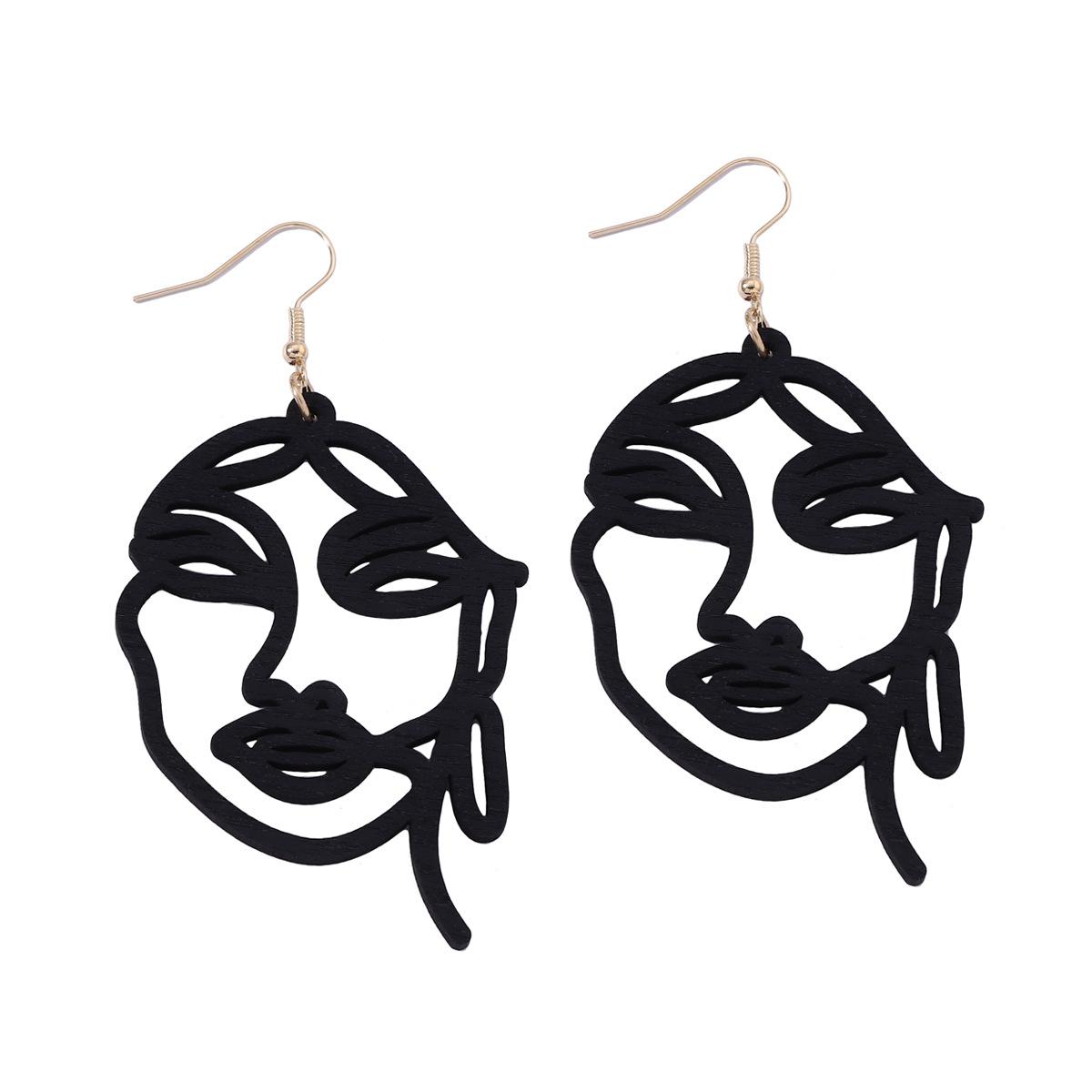 

Niche design sense, personalized earrings, fashionable and trendy laser-cut wooden abstract face ear hooks