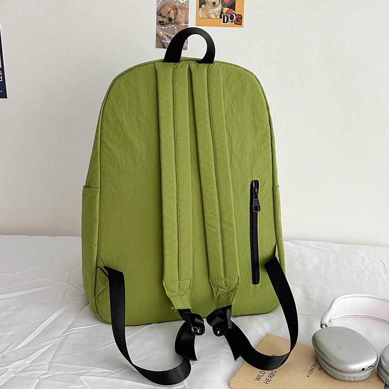 Lightweight Minimalist Backpack for Female Students: Versatile Double-Shoulder Bag for School and Travel.