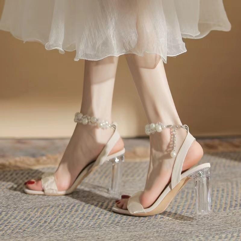 

Fashion pearl buckle high-heeled sandals women s 2025 new summer wear versatile square head transparent crystal heel sandals 35