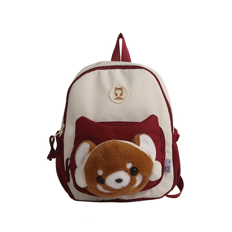 Cute Cartoon Trendy Backpack: Large Capacity, Lightweight, Versatile Travel/School Bag with Earphone and Doll Holder.