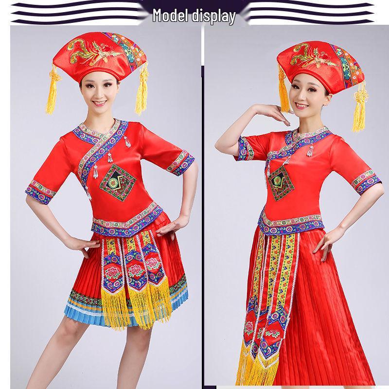 Guangxi 3. března Zhuangský ženský festivalový taneční kostým