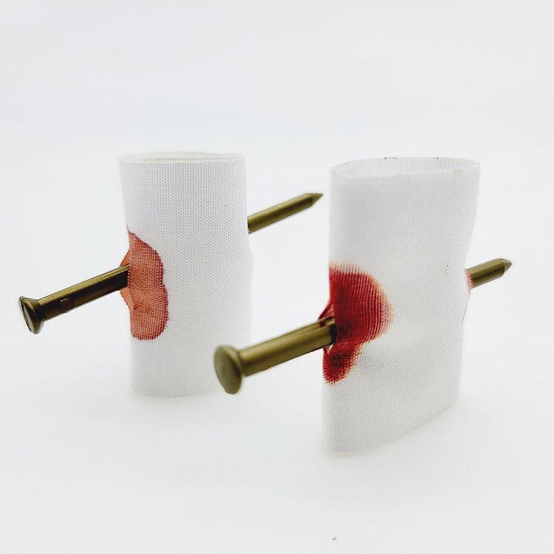 April Fool's Prank Finger Through Nail Toy