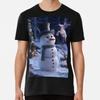 Snowman In a Winter Scenery. T-Shirt