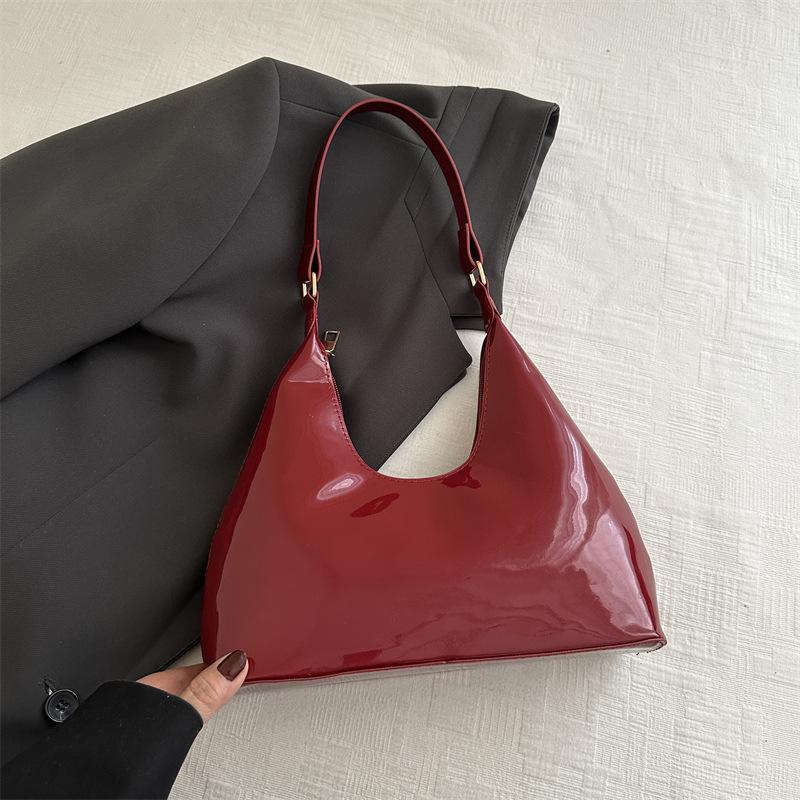 Temperament lässig glänzend 2025 ausländischer Stil Frühling und Sommer neu Lackleder Mode leichte Luxus Schultertasche tragbar Unterarm Damen Tasche