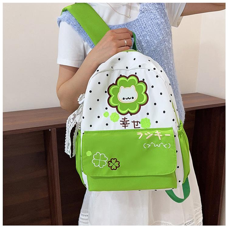 Schoolbag printed four-leaf clover backpack polka dot kitten girl light and cute versatile casual student backpack schoolbag new
