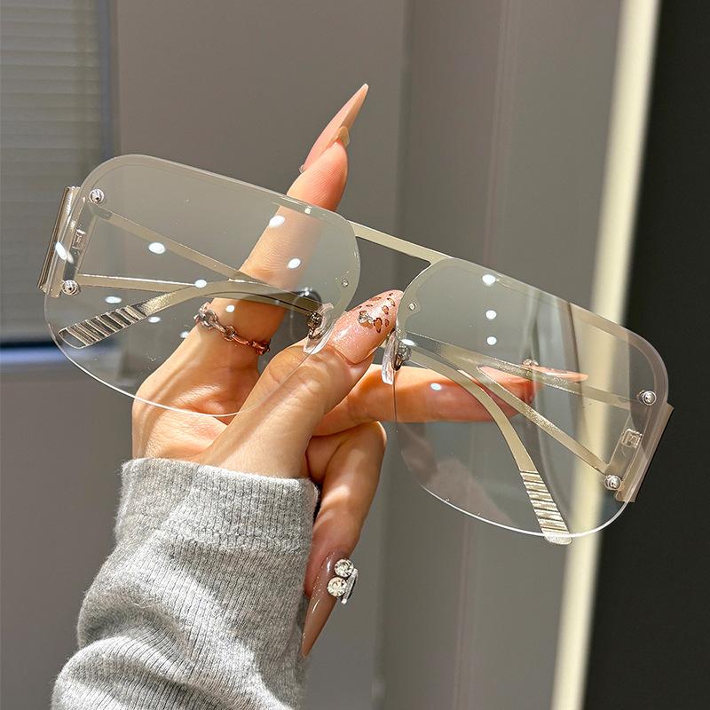 New European and American fashion frameless sunglasses women's large frame metal frame high-end men's sunglasses tide