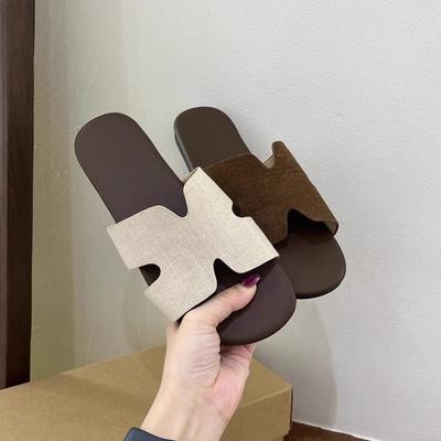 Zapatillas de lino coreanas para mujer para llevar en verano nuevas sandalias de una tira H estilo vacacional playa seaside sandalias planas suaves