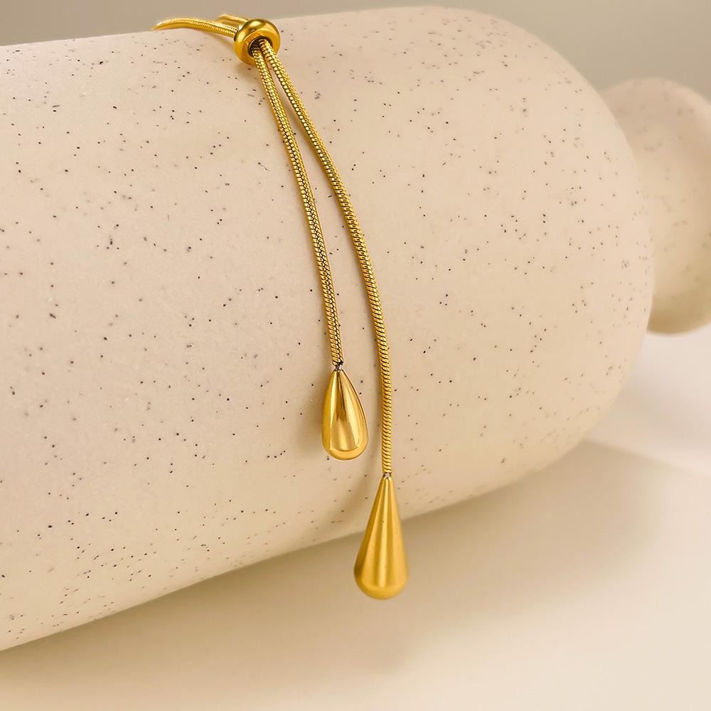 Moda Europa e América Cor Dourada Aço Inoxidável Pingente de Colar com Franja Gota d'Água para Mulheres Corrente Clavicular Joias de Festa