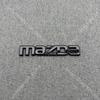 ABS Car Logo Front Grille Rear Trunk Steering Wheel Decoration Sticker For MAZDA2 2009- 2011-2015 16 17-2025 2026 MAZDA2 Emblem BBF3