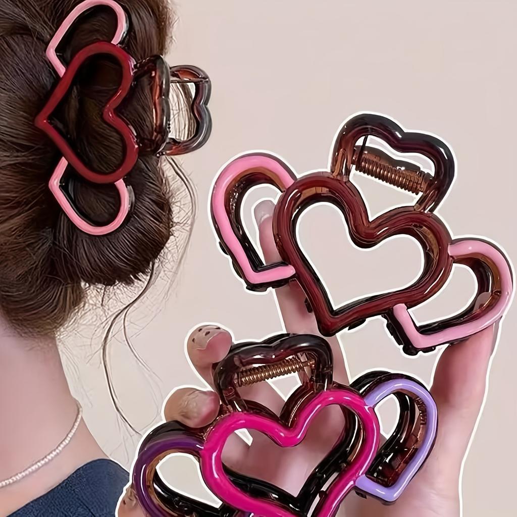 One elegant heart-shaped hairpin, a half-tied hairpin, a stylish hairpin, and a shark clip at the back of the head