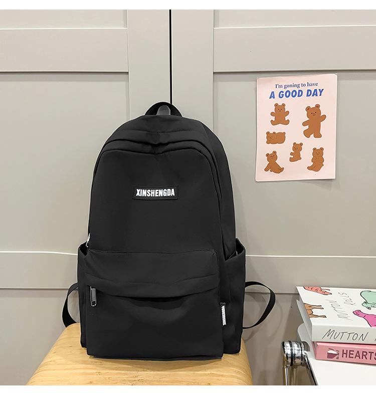 Elementary school bag, female junior high school student solid color backpack, high school student large capacity casual backpack fashion