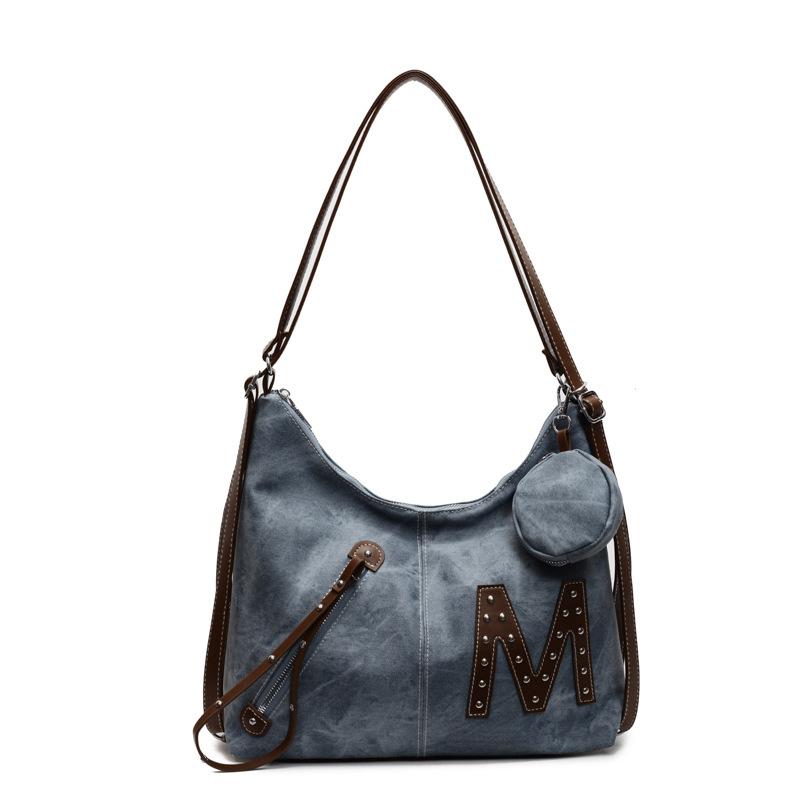 New women's bag niche fashion versatile backpack commuter shoulder messenger bag one pack three-purpose back