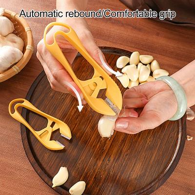 Nerezový škrabka na cesnak Zeleninová škrabka Manuálny nástroj na lúpanie cesnaku s háčikom