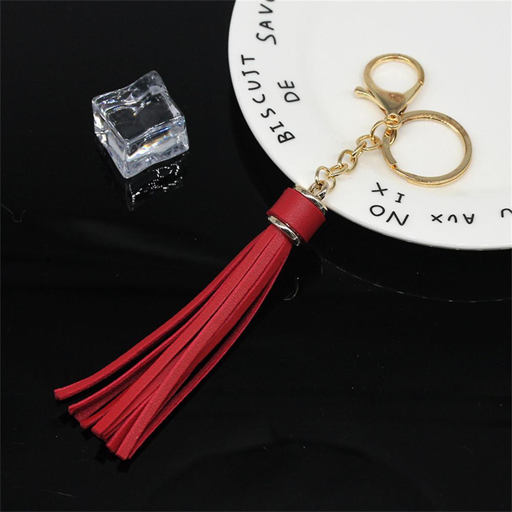 Модный простой кожаный брелок с кисточками для женщин — фото 8