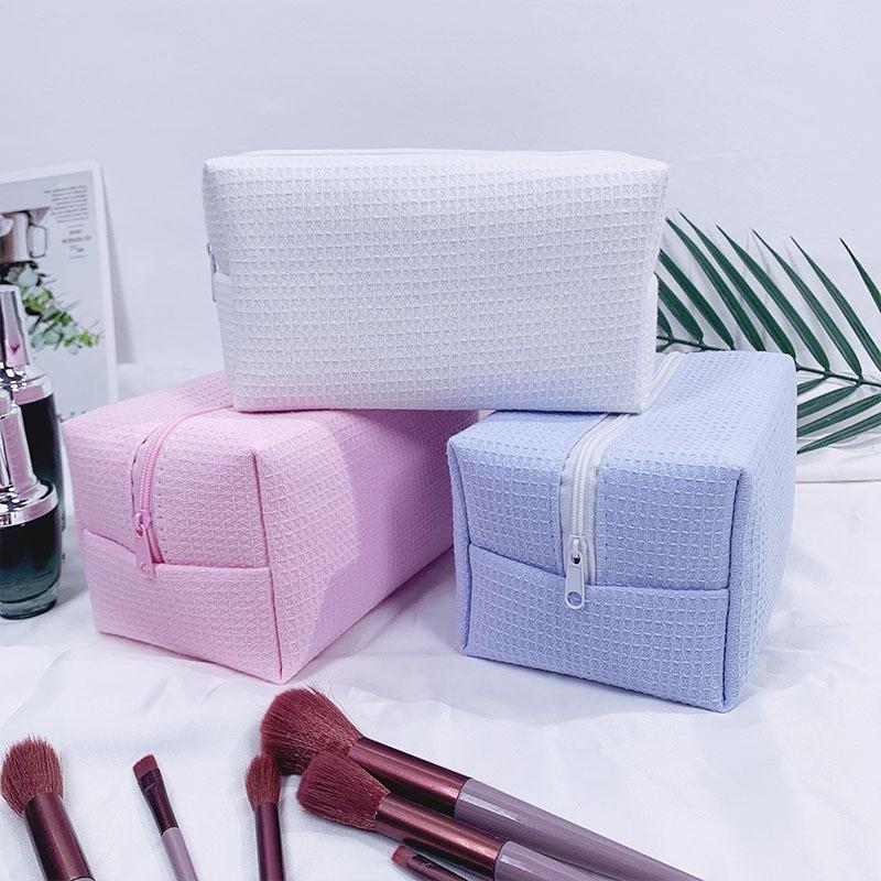 Trending Waffle Cosmetic Bag: Solid Color, Spacious, Women's Handheld Toiletry Organizer