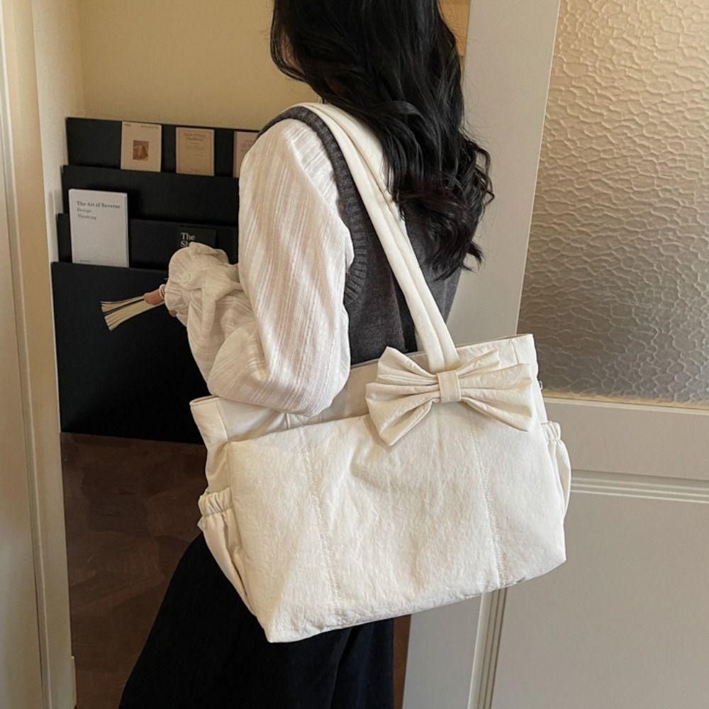 Temperament Korean Style Bow Tote Bag Large Capacity Simple Cotton Padded Shoulder Bag Fashion Solid Color Nylon Handbag Ladies