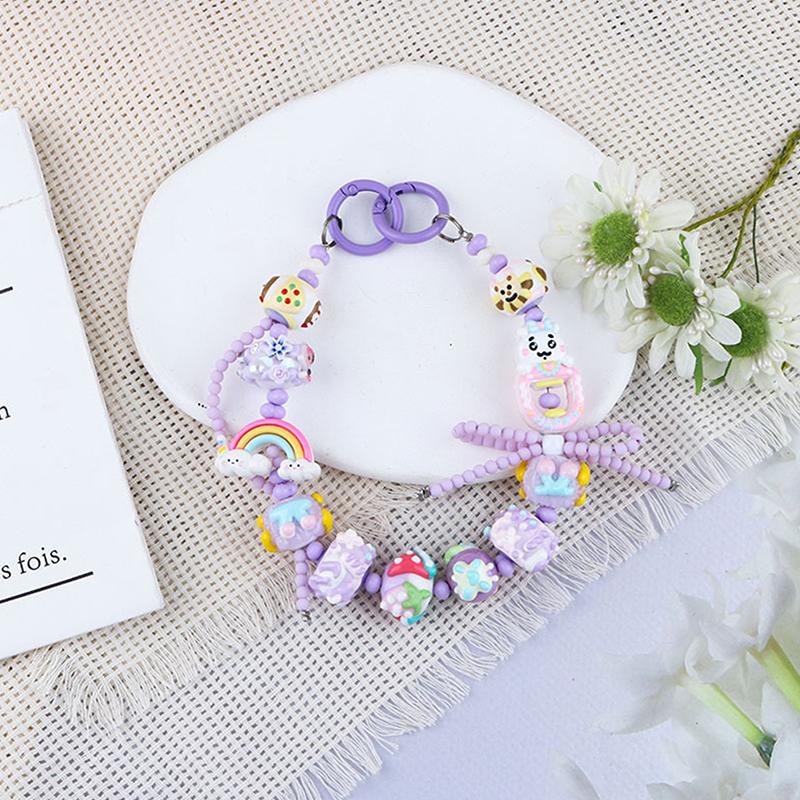 

Цветной милый нарисованный вручную бисерный кулон на цепочку для мобильного телефона, чехол для телефона с защитой от потери, подвеска на запястье, украшение фиолетовый