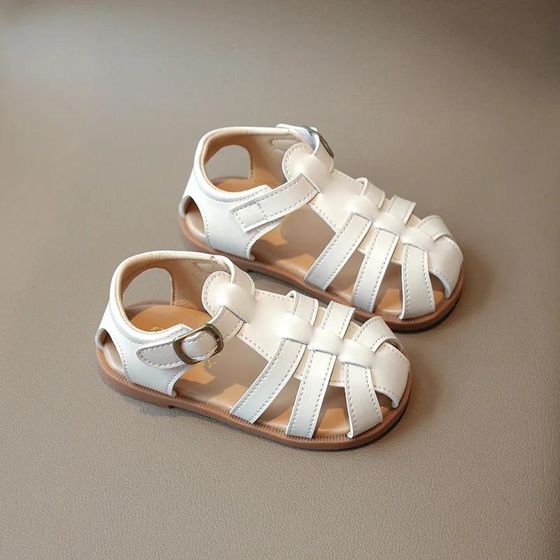 

Летние новые детские сандалии для девочек 2024 года, модные удобные тканые вырезы, корейские простые универсальные римские классные пляжные туфли 16