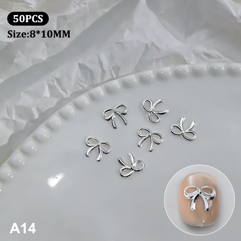 50 st Metalllegering Rosett Naglar Konst Dekoration Silver Guld Nagelberlocker DIY Manikyr Design Smyckestillbehör Verktyg