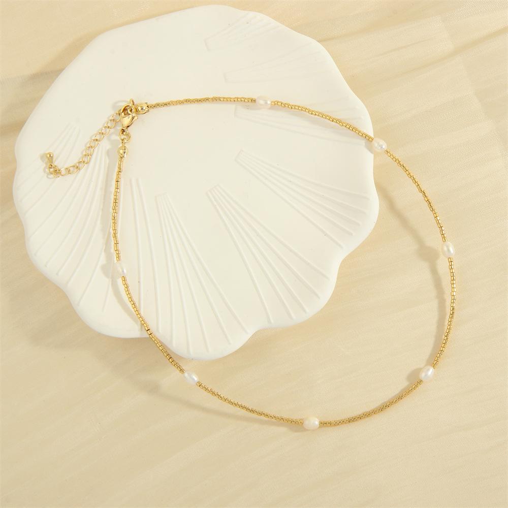 

Элегантное двухслойное ожерелье из жемчуга и полудрагоценных камней - Минималистичный дизайн для женщин