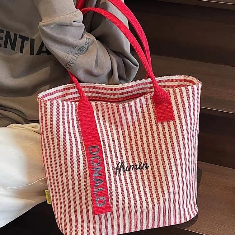 

2025 Нова жіноча велика містка полотняна сумка-тоут: Літня смугаста корейська сумка через плече червоний