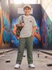 Boys 2 Piece Outfit Set, Striped Textured Short Sleeve T Shirt With Leather Label Decor and Cargo Wide Leg Pants