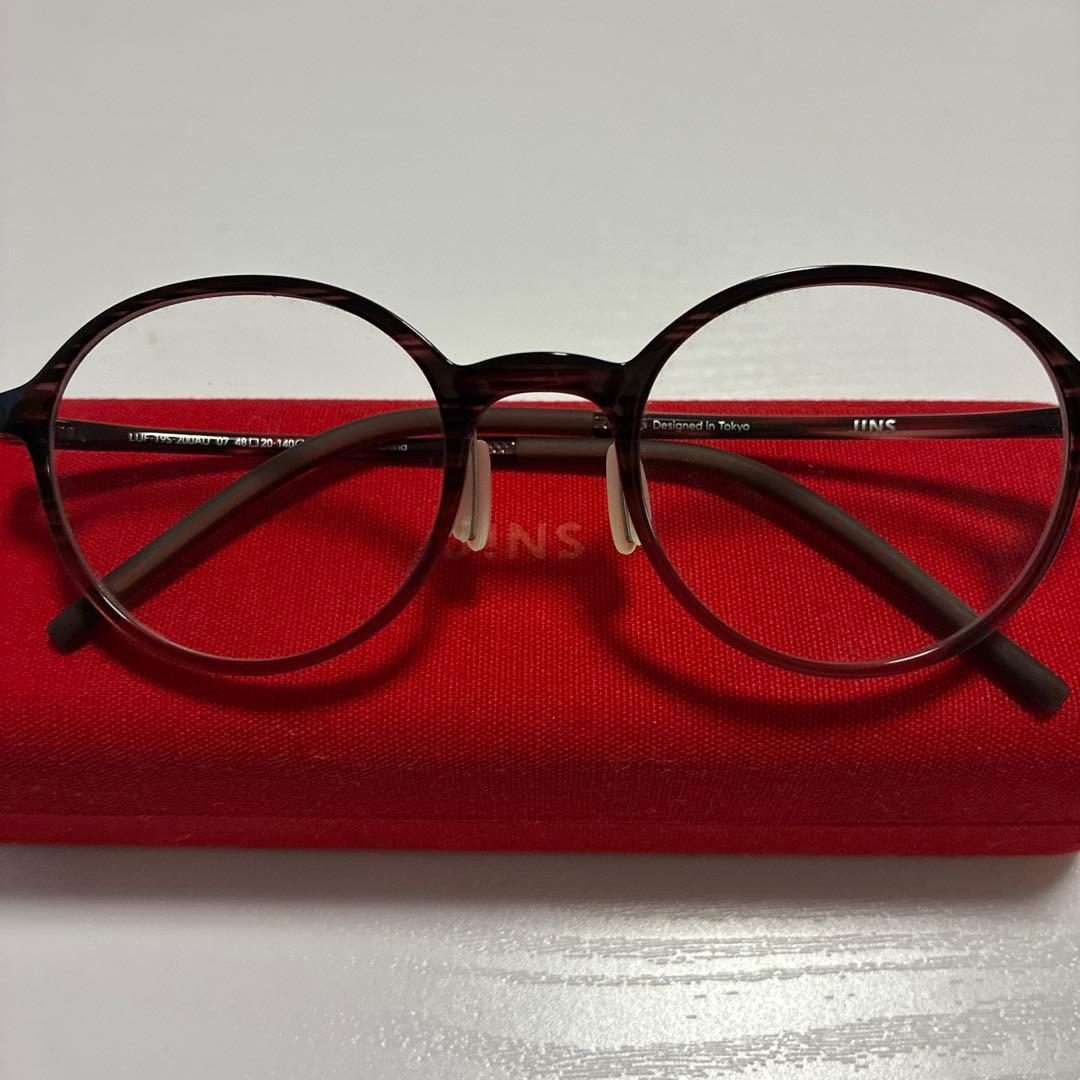 Used Non-prescription JINS glasses with unused case, stretchable and lightweight