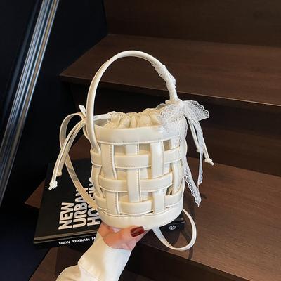 Creative Personalized Woven Bag Mini Spring and Summer Pumping Belt Cylinder Hollow Oblique Span Mini Bucket Women's Bag