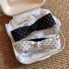 Elegant Black & White Polka Dot Bow Banana Clip: Fashionable Hair Accessory for Women.