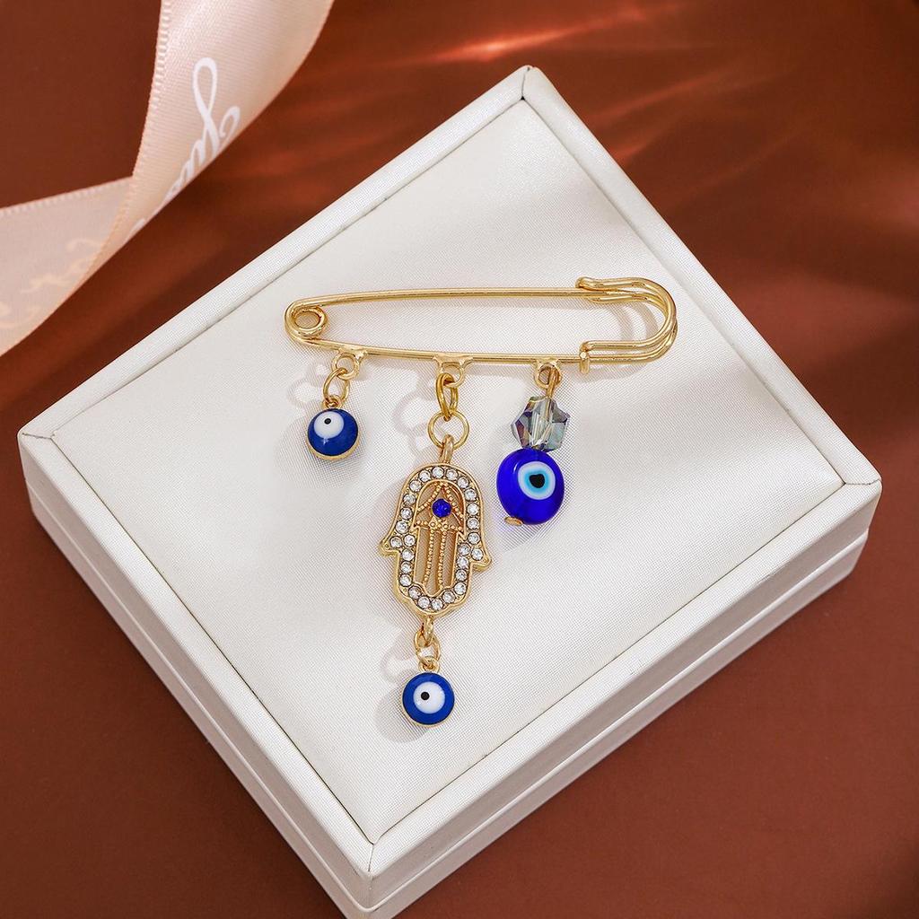 Creative Rhinestone Devil's Eye Tassel Brooch: Women's High-End Blue-Eyes Sweater Pin