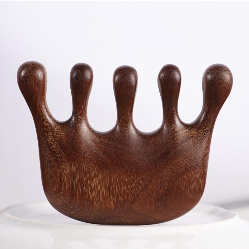 One Piece Gold Sandalwood Five-Tooth Massage Comb for Head and Meridian Stimulation.