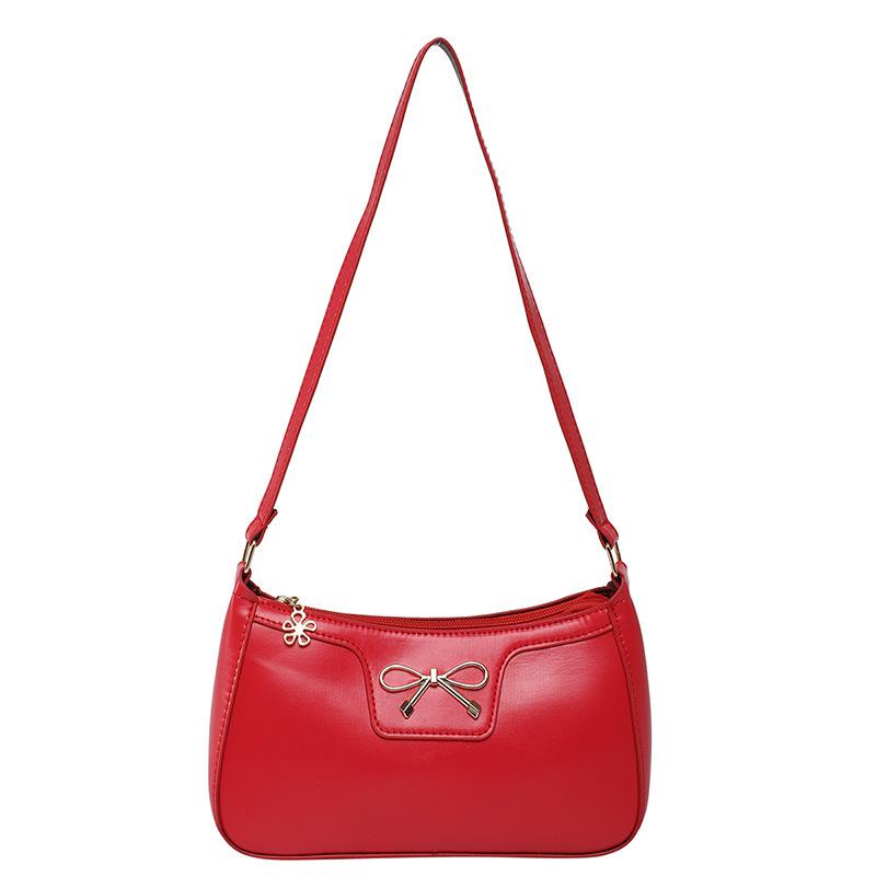 Fashion bow 2025 solid color new Korean version trendy texture foreign style commuting single shoulder underarm baguette bag women