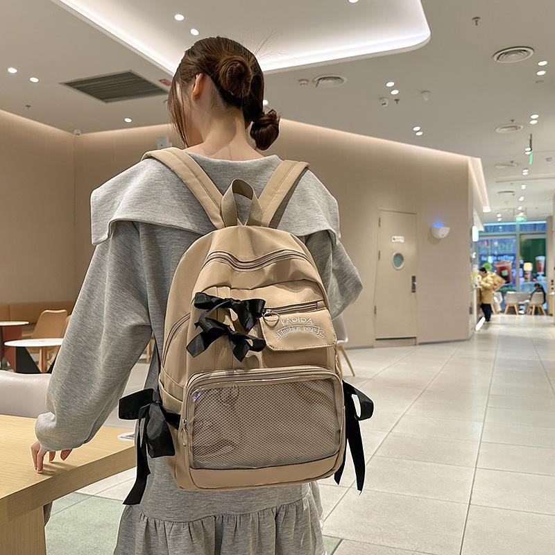 Bow schoolbag female corduroy junior high school students primary school students Internet celebrity backpack large capacity niche backpack