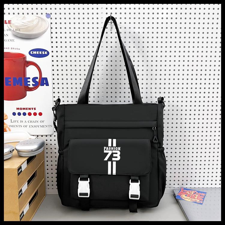 Schoolbag Korean version ins new high-value niche design letter satchel couple light travel to work make-up class messenger bag