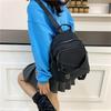 Schoolbag Simple temperament Casual backpack Multi-pocket large capacity Lightweight backpack Fashion versatile shoulder messenger bag