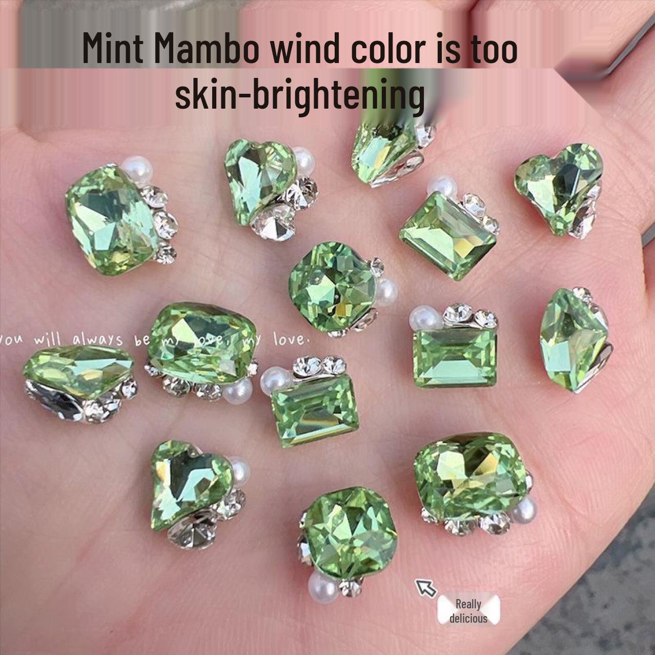 

Mint Mambo Wind Green Nail Art: Asymmetrical Hearts, Rectangles, and Diamonds with Rhinestones - Light Luxury and Super Sparkly. Wind Green Heart Rhinestone