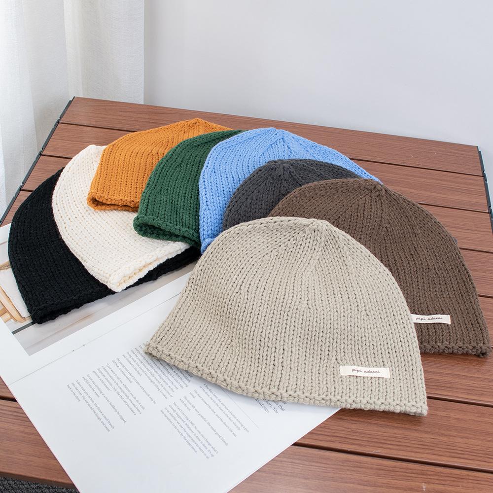 Simple solid color knitted bag head stacking hat women's early autumn new plain and versatile big head circumference showing face small wool hat