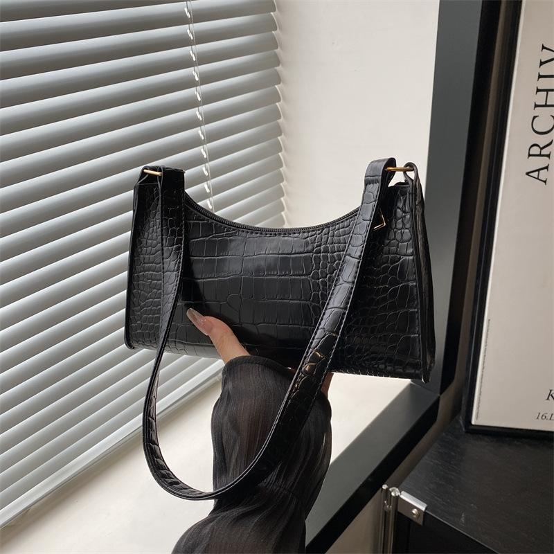 

Женская сумка подмышку сумка-багет 2025 новая французская простая текстура зарубежный стиль для поездок на работу модная ручная сумка на плечо