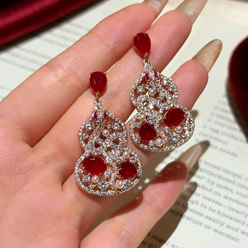 Silver needle ethnic style zircon empty gourd stud earrings new Chinese retro personality temperament earrings light luxury high-end earrings